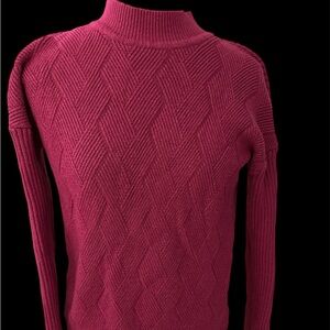 Pink sweater with pattern. Size Medium.